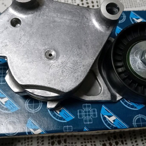 Timing belt tensioner Opel Corsa D new