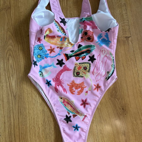 Women's one-piece swimsuit pink with colorful sea life print