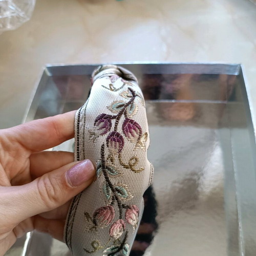 Hairband like new with embossed floral embroidered design