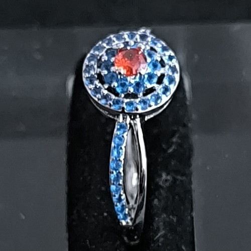 Ring with blue and red stones, elegant design