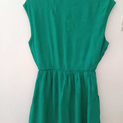 Short green dress with pockets used, size M