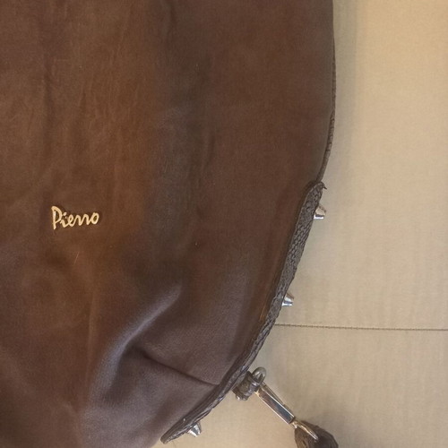 Pierro faux leather bag and Lollipops real fur bag used