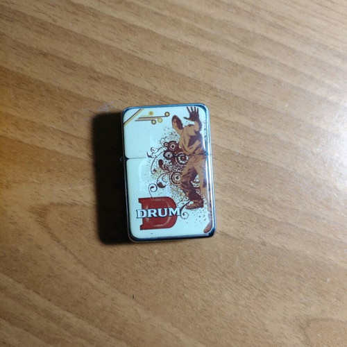 Drum promotional lighter used, functional, collectible