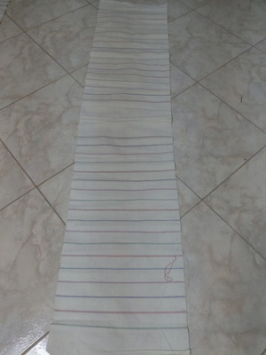 Traditional cotton fabric on loom, new, white with colorful stripes