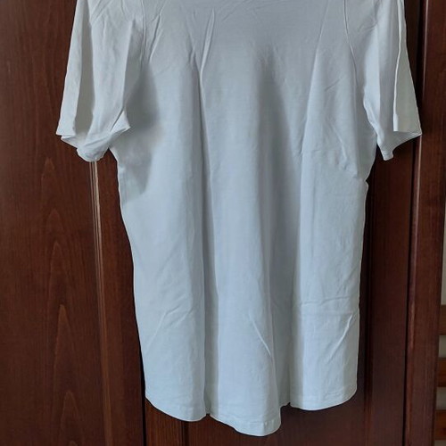 White T-shirt medium size used for women