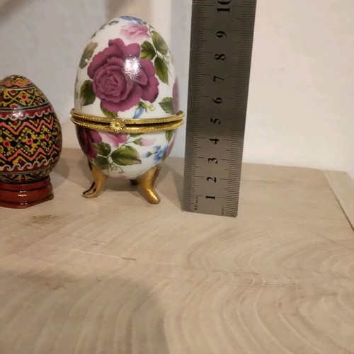 Egg box set like new, 1 wooden and 1 porcelain