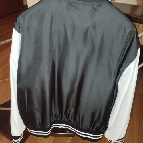 Only college style jacket like new, black and white, medium