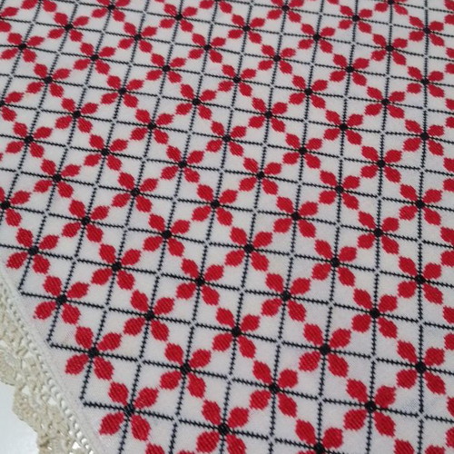 Large embroidered table runner used with handmade lace