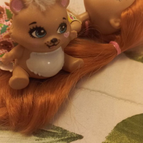 Doll with her pet like new