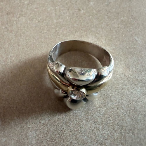 Silver and gold ring with diamond used
