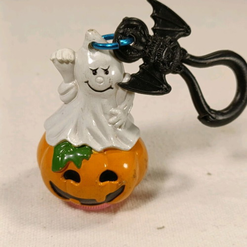 Halloween vintage keychain and scraper used
