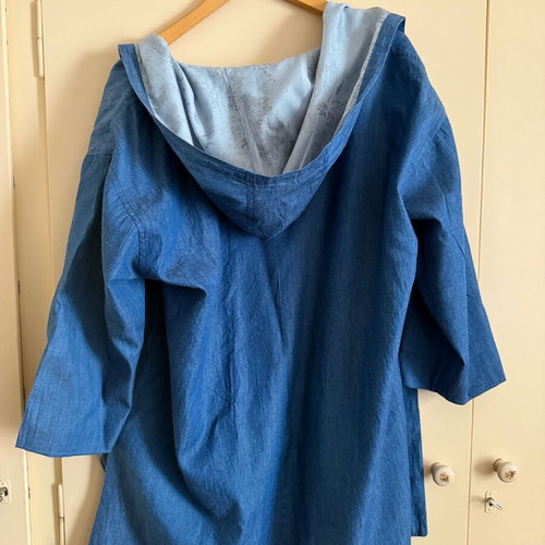 Namaste trench coat used in denim color with lining and hood