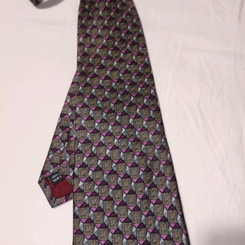 Vogue silk tie used with geometric pattern in brown and purple