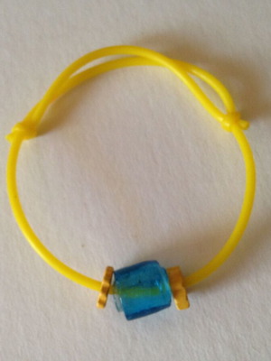 Bracelet used yellow with blue bead