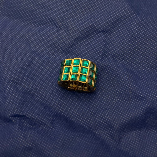 Adjustable gold ring with emerald stones like new