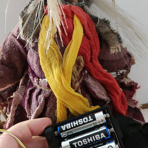 Witch figure used with sound and light-up hair