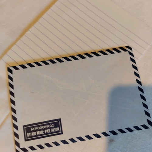 Envelopes and paper sheets new, set of three