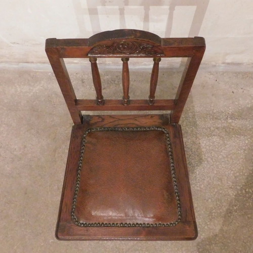 Wood-carved chairs with leather seat like new, set of 4