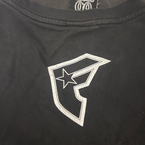 Famous 06 T-shirt used, size large, black cut-sleeve