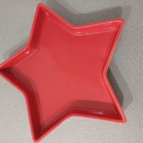 Star-shaped red plate used, 40cm