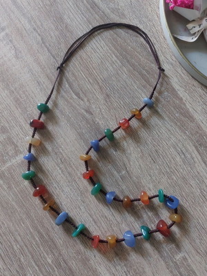 Long necklace with colorful stones and brown cord like new