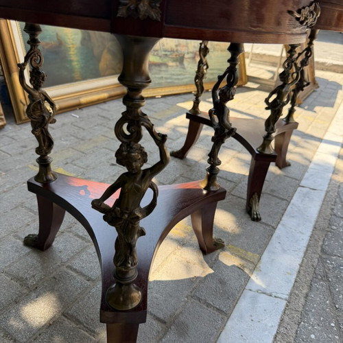 French coffee tables like new with bronze cherubs and lion paw legs, pair