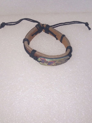 Handmade leather boho bracelet with butterfly and peace sign like new