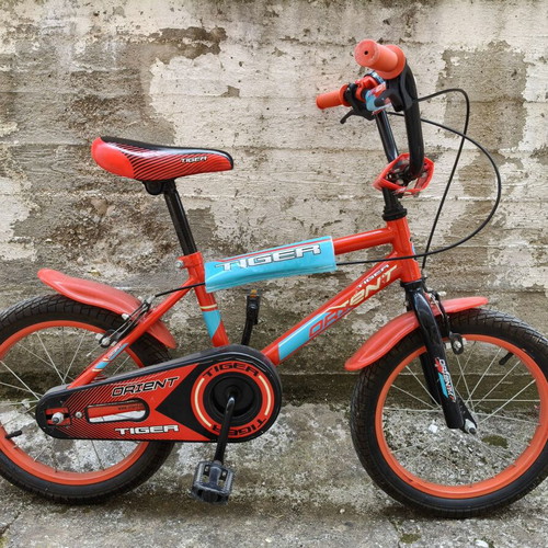Children's bicycle used, 16-inch wheels, city style, red