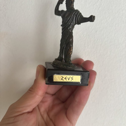 Zeus figurine like new, heavy metal with patina on black base