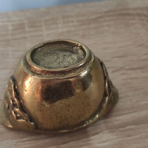 Vintage brass miniature vessel with embossed design