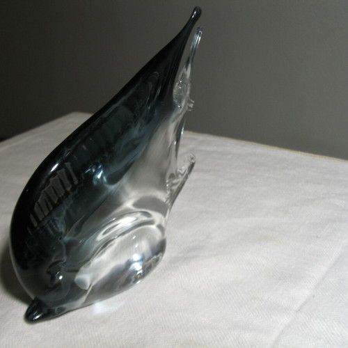 Glass decorative fish used with small tail chip