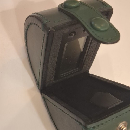Cylindrical leather vintage travel case with small clock by Giorgio Pizzitutti