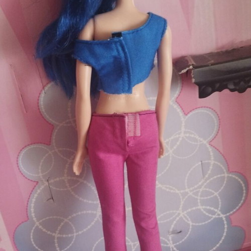 Barbie doll with blue hair