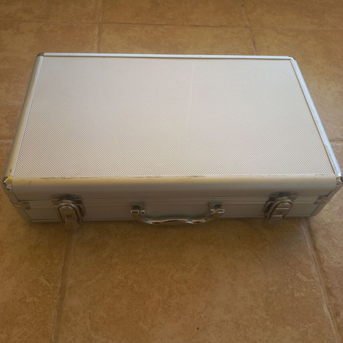 Aluminum Coin Case like new, silver, with four inner compartments