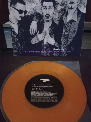 Therapy 45rpm used orange vinyl record