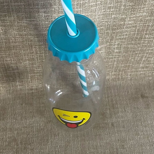 Plastic Transparent Bottle with Straw and Emoji Face Used