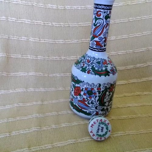 Metaxa porcelain bottle used, painted, 37 centimeters