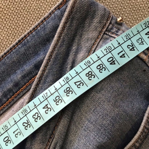 Zara women's blue jeans size 42 with metal studs and frayed hems like new