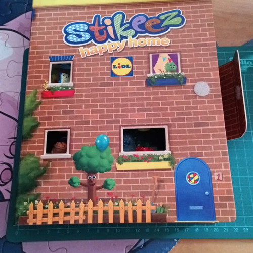 Stikeez Happy Home collectible box-album by Lidl