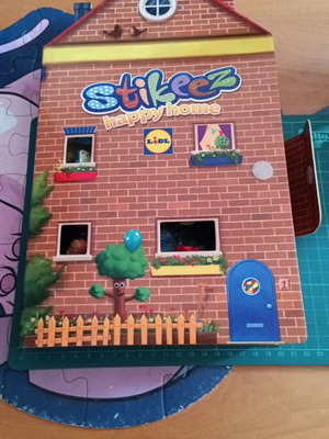 Stikeez Happy Home collectible box-album by Lidl