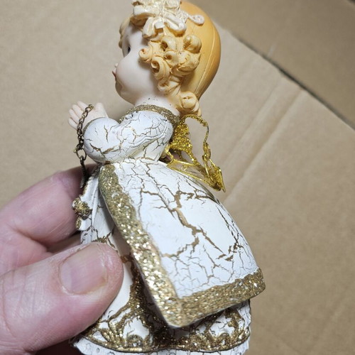 Ceramic decorative angel figurine used
