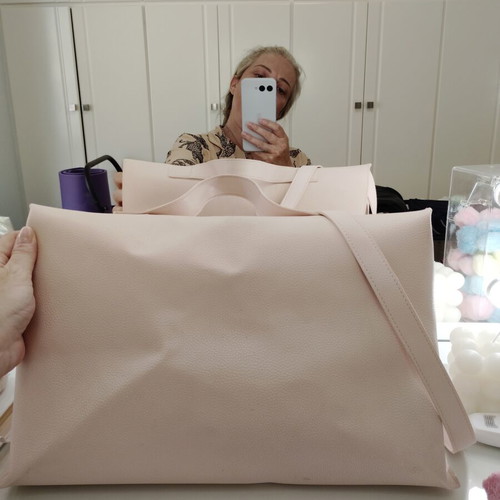 Polo handbag in powder pink like new with detachable strap and wide handle