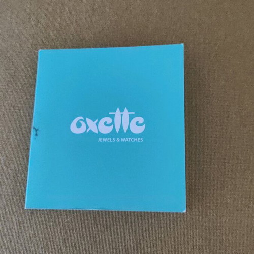 Oxette women's watch like new with blue rubber strap and crystals