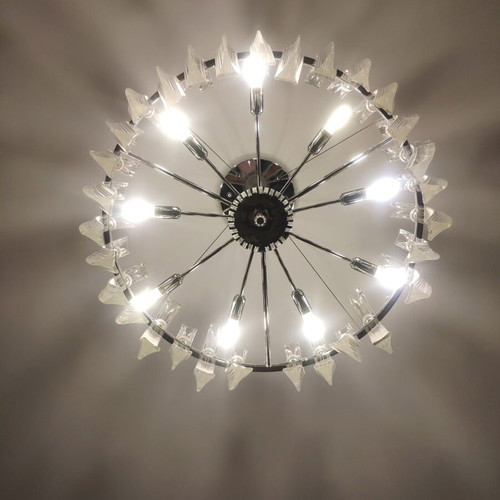 Ceiling chandelier used, missing two glass rods