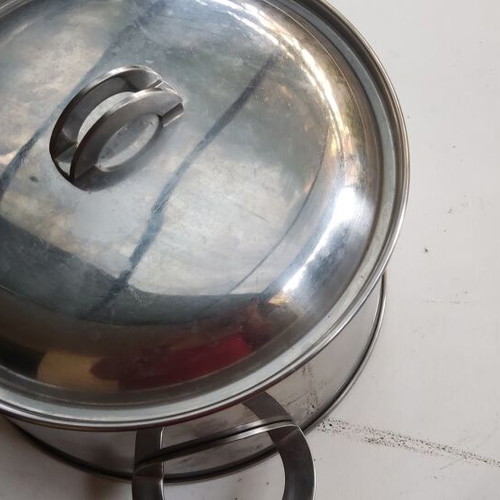 Cookware set used with pot, steamer, sieve, and colander