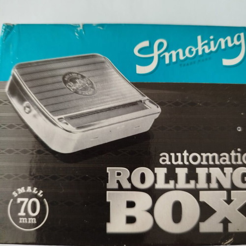 Metal cigarette rolling box new with machine and papers