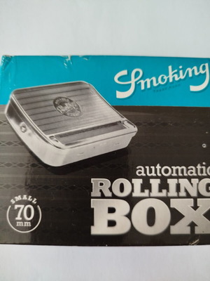 Metal cigarette rolling box new with machine and papers