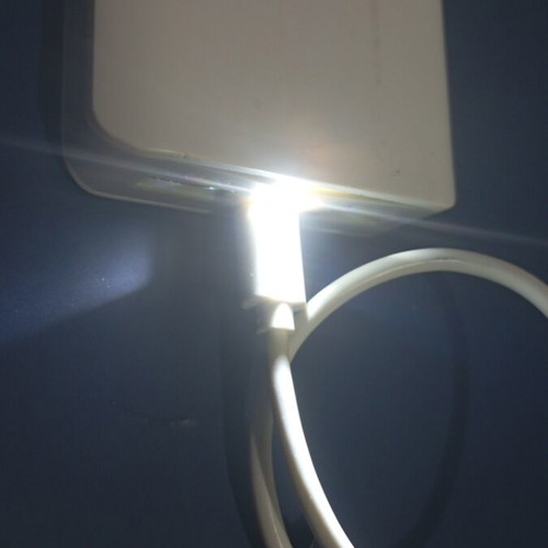 USB charger with flashlight, used, two charging ports
