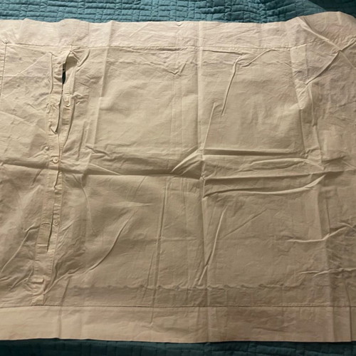 Pillowcase with cutwork embroidery used, button closure