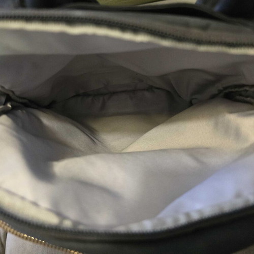 Tumi backpack used, black with gold details